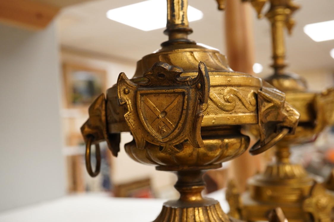 A pair of late 19th century French ormolu candlesticks, 37cm